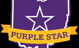 Detail of Purple Star logo with state of Ohio in purple, star in the middle and yellow banner beneath reading "Purple Star"