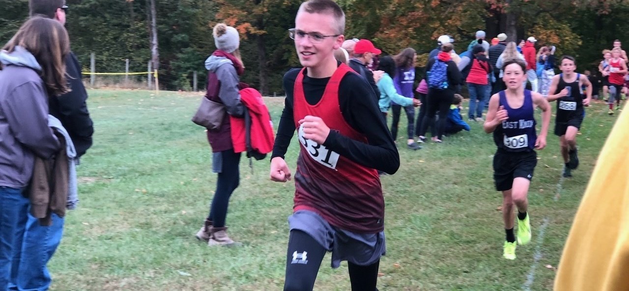 Photo of Cross Country athletes competing