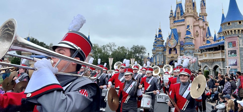 Band Members marching in front of Magic Castle at Disney World