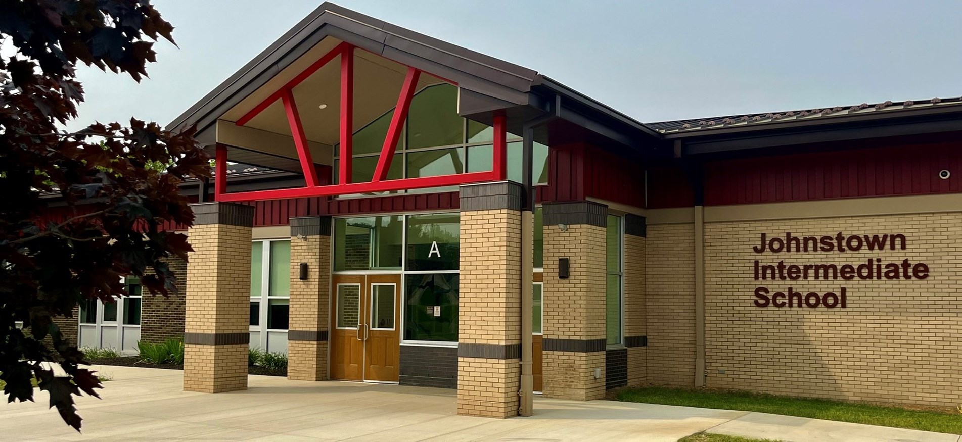 Exterior photograph of the the front entryway to Johnstown Intermediate School